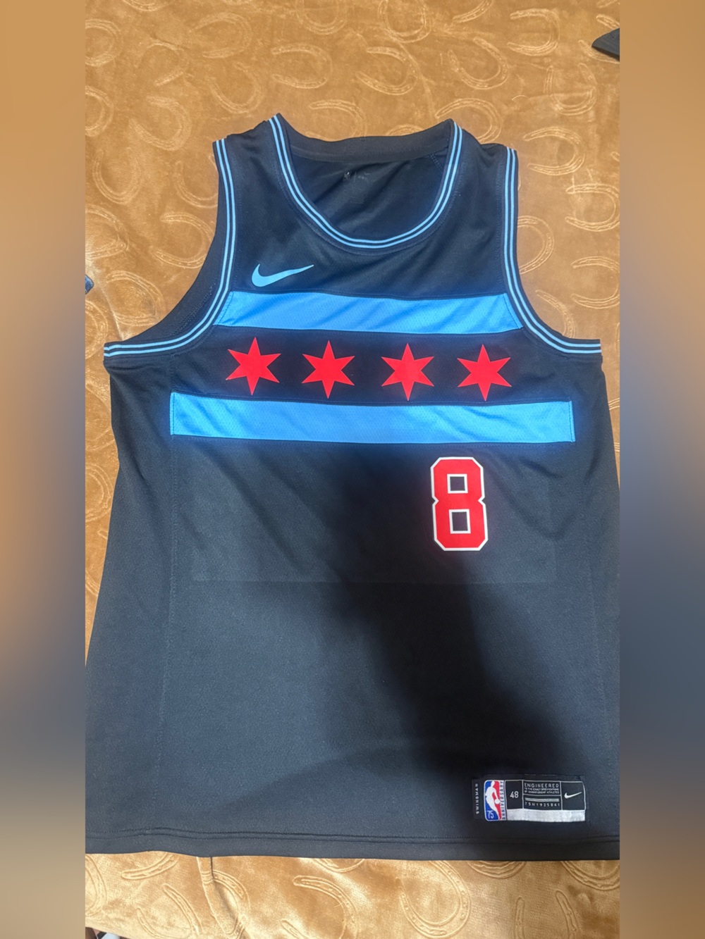 Nike Black Lavine Basketball Jersey with Light Blue Stripes & Red Accents